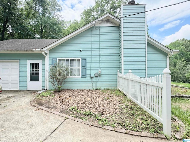 view of home's exterior featuring a garage