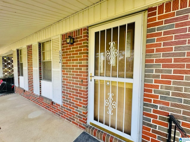 entrance to property with covered porch