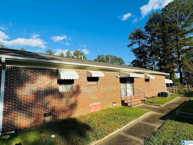 exterior space featuring central air condition unit