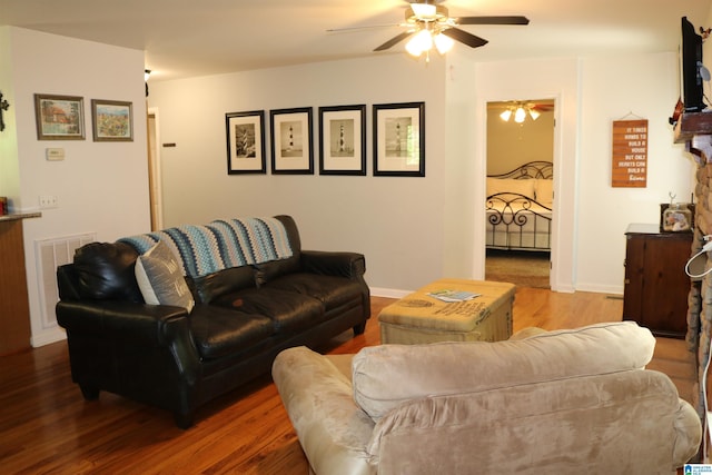 551 Poplar Pl, Wedowee, AL 36278 - living area featuring a ceiling fan and wood finished floors