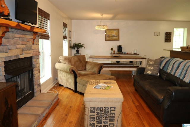 551 Poplar Pl, Wedowee, AL 36278 - living area with wood finished floors and a stone fireplace