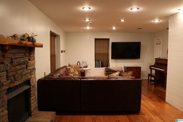 551 Poplar Pl, Wedowee, AL 36278 - living room featuring a fireplace, wood finished floors, and recessed lighting