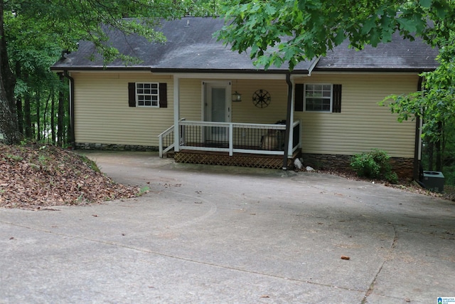 ranch-style home with covered porch