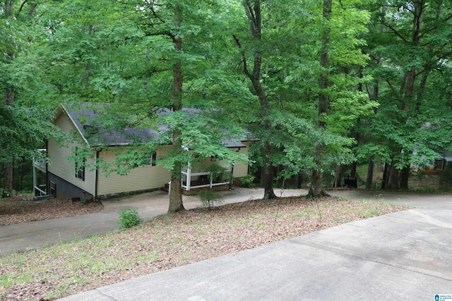 551 Poplar Pl, Wedowee, AL 36278 - obstructed view of property featuring concrete driveway