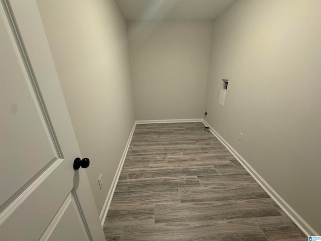 laundry room featuring washer hookup and wood-type flooring