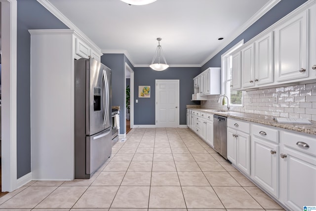 kitchen featuring crown molding, sink, white cabinetry, and stainless steel appliances