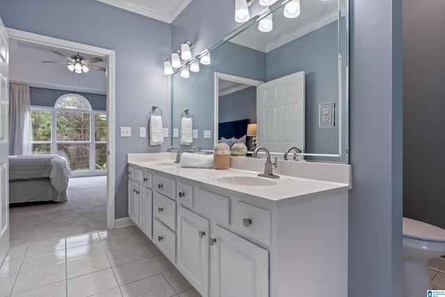 bathroom featuring vanity, tile patterned floors, ceiling fan, and ornamental molding