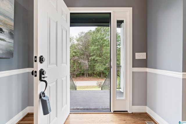 doorway featuring hardwood / wood-style flooring