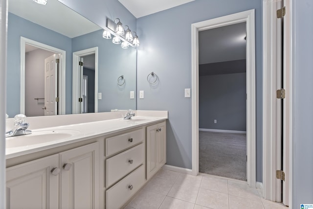 bathroom featuring tile patterned flooring and vanity