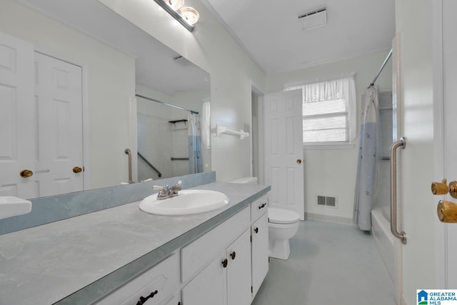 full bathroom featuring shower / bath combo, vanity, and toilet