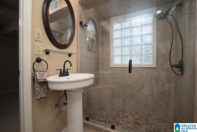 bathroom with walk in shower