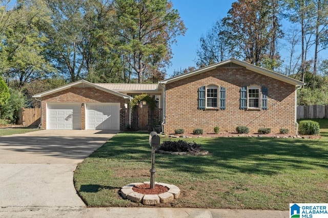 ranch-style house featuring a front lawn and a garage