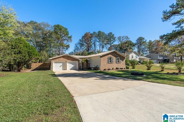 ranch-style house featuring a garage and a front lawn