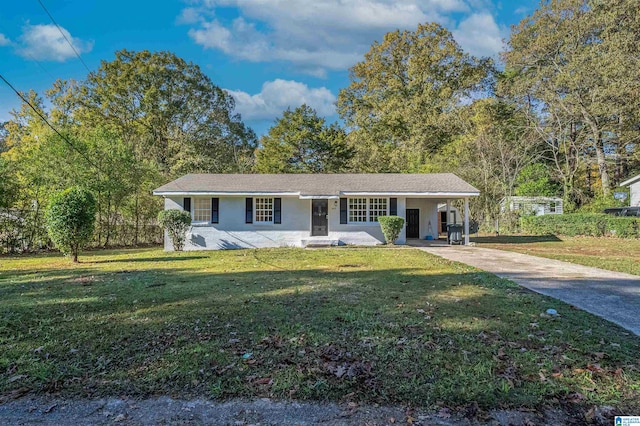 ranch-style house with a carport and a front yard