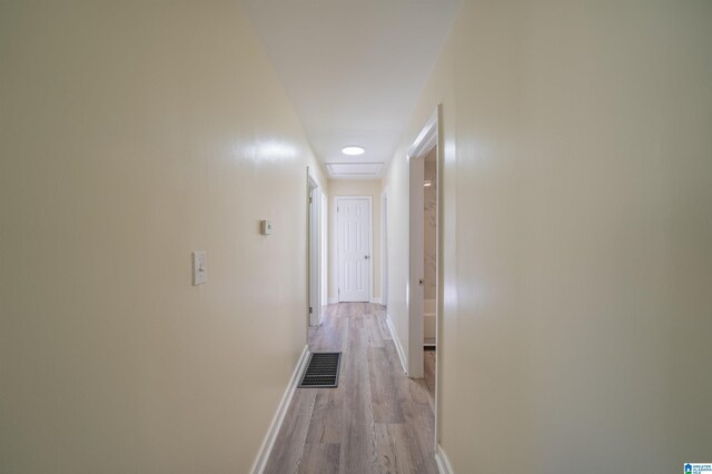 hallway featuring light hardwood / wood-style flooring