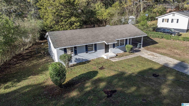 ranch-style home with a porch and a front yard