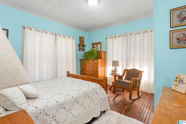 923 Cogswell Ave, Pell City, AL 35125 - bedroom featuring hardwood / wood-style flooring and ornamental molding