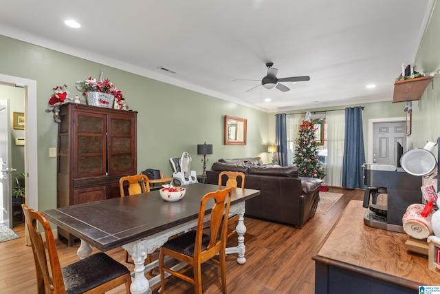 923 Cogswell Ave, Pell City, AL 35125 - dining room with ceiling fan, wood finished floors, ornamental molding, and recessed lighting