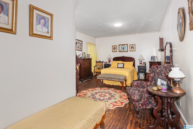 923 Cogswell Ave, Pell City, AL 35125 - bedroom featuring hardwood / wood-style floors and a textured ceiling