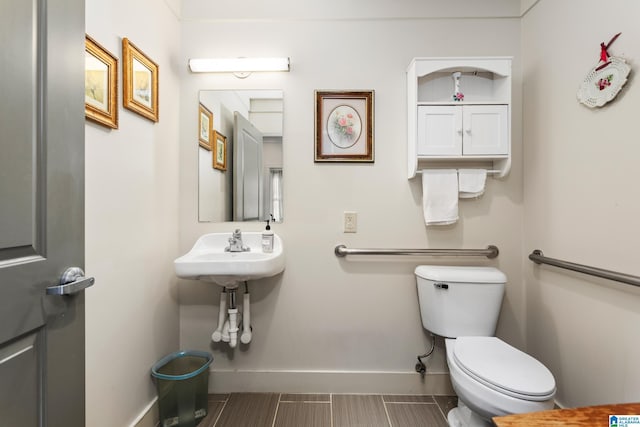 923 Cogswell Ave, Pell City, AL 35125 - bathroom with baseboards and toilet