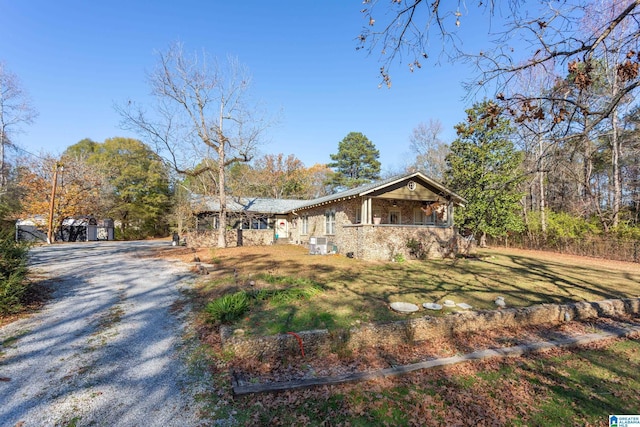 923 Cogswell Ave, Pell City, AL 35125 - ranch-style house with driveway and covered porch