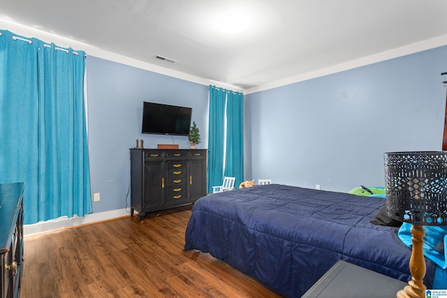 923 Cogswell Ave, Pell City, AL 35125 - bedroom featuring wood finished floors and baseboards
