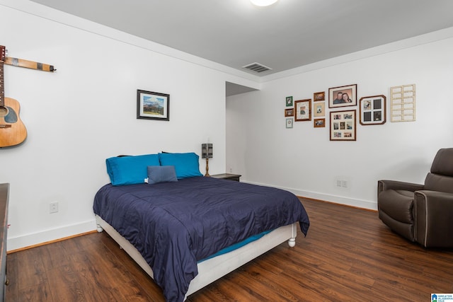 923 Cogswell Ave, Pell City, AL 35125 - bedroom featuring baseboards and wood finished floors