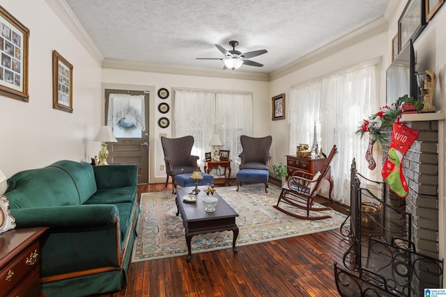 923 Cogswell Ave, Pell City, AL 35125 - living area featuring ceiling fan, a textured ceiling, hardwood / wood-style floors, and crown molding