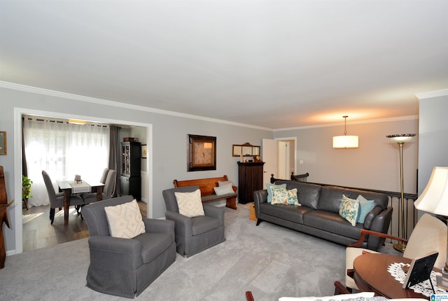 living room with crown molding and light hardwood / wood-style flooring