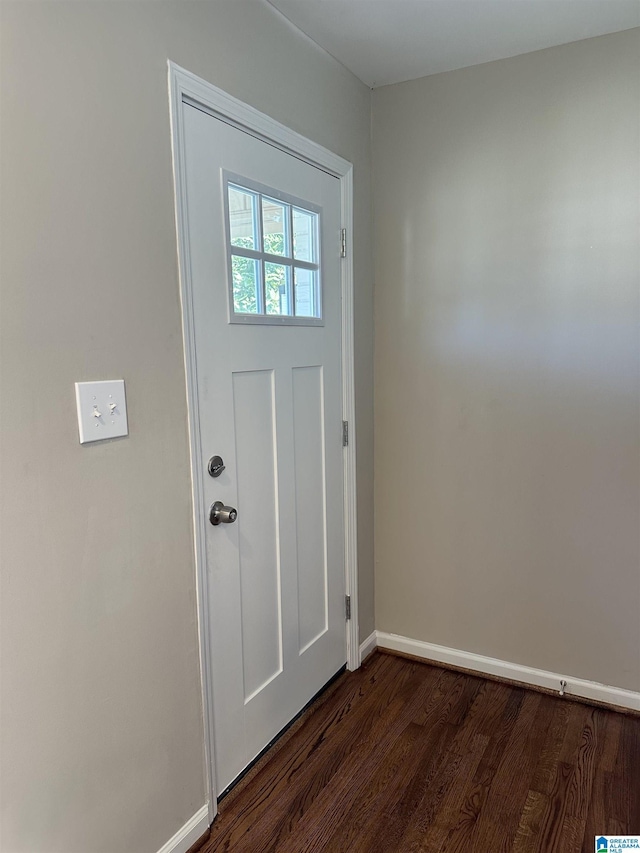 101 S 18th Ct, Birmingham, AL 35205 - doorway featuring dark wood-type flooring and baseboards