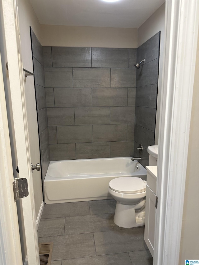 101 S 18th Ct, Birmingham, AL 35205 - full bath featuring shower / washtub combination, toilet, wood tiled floors, and vanity