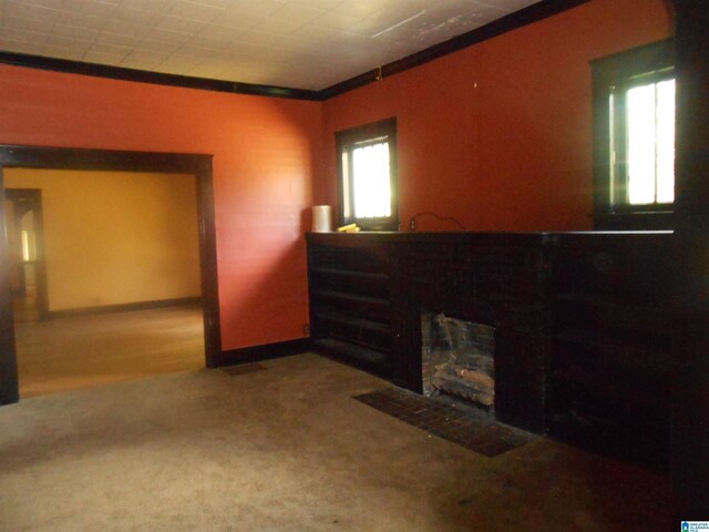 1387 Hueytown Rd, Hueytown, AL 35023 - living area featuring ornamental molding, carpet, and baseboards