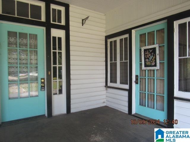 entrance to property with covered porch