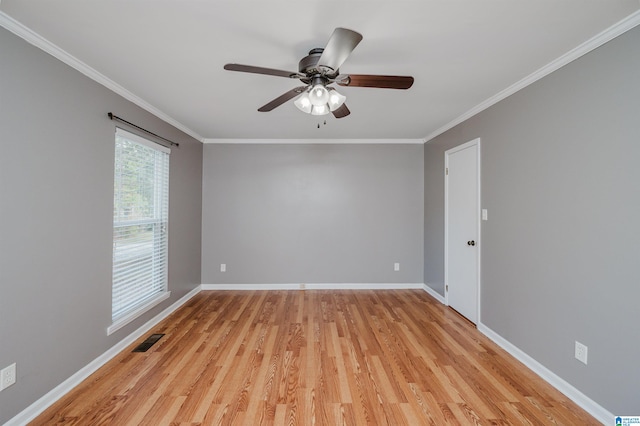 unfurnished room with ceiling fan, light hardwood / wood-style floors, and ornamental molding