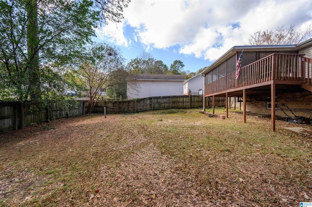 view of yard featuring a wooden deck