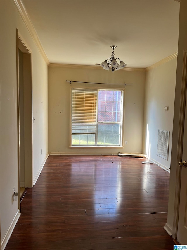 empty room with a chandelier, ornamental molding, and dark hardwood / wood-style flooring