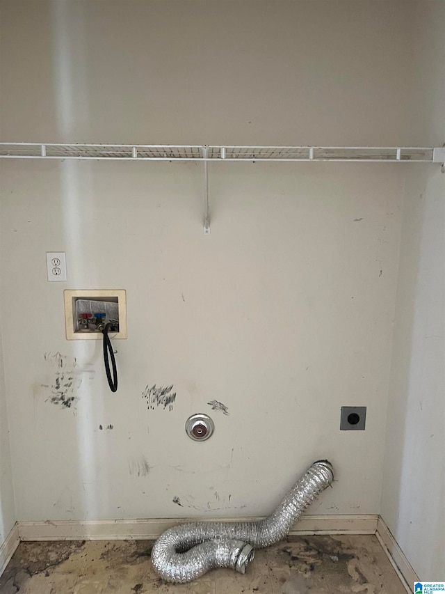 clothes washing area with washer hookup and hookup for an electric dryer