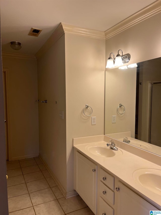 bathroom with vanity, tile patterned floors, and ornamental molding