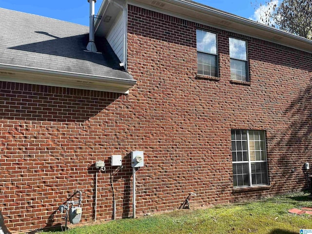 view of property exterior featuring a yard