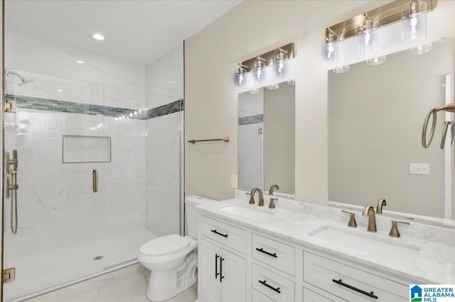 bathroom featuring toilet, vanity, and walk in shower