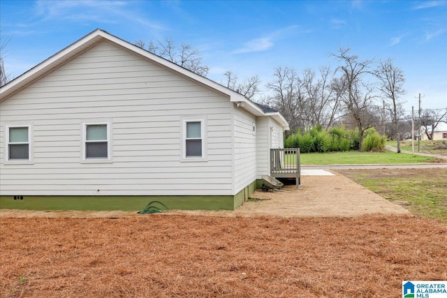 view of home's exterior featuring a lawn