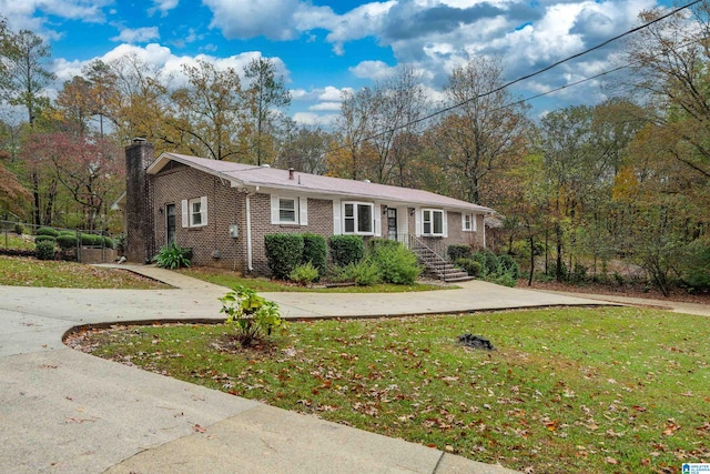 ranch-style house with a front yard