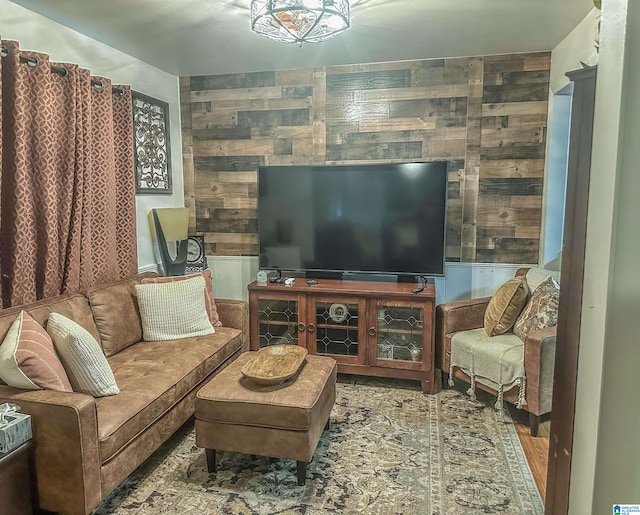 living area with wood walls