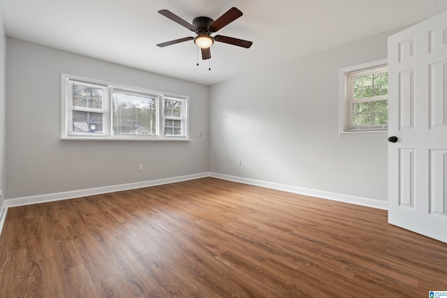 unfurnished room with wood-type flooring and ceiling fan