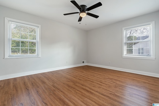 unfurnished room featuring wood-type flooring and ceiling fan