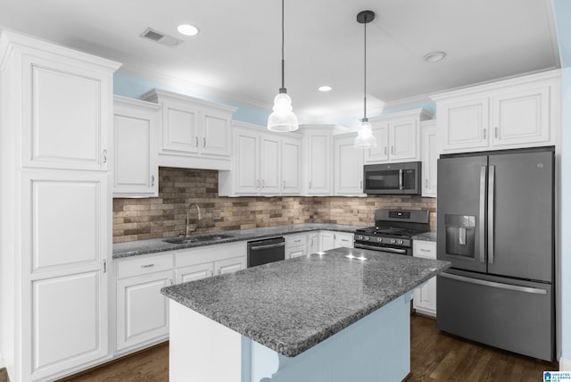 kitchen with appliances with stainless steel finishes and white cabinetry