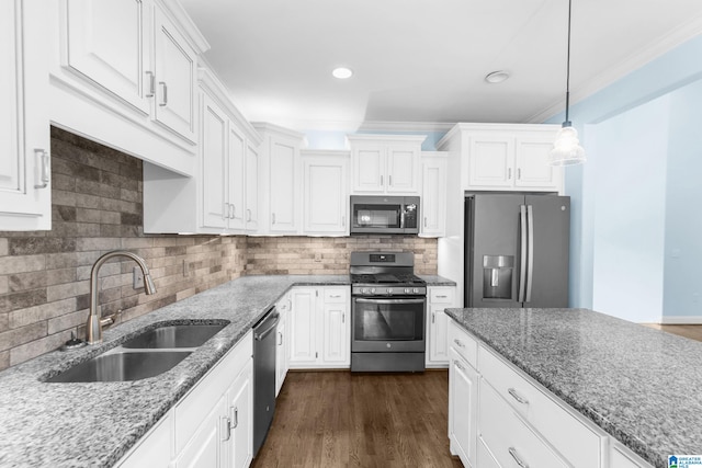 kitchen featuring dark wood-type flooring, sink, white cabinets, and stainless steel appliances