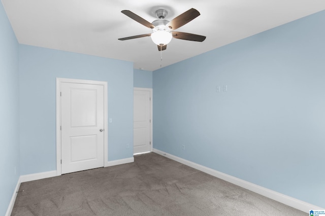 unfurnished bedroom with ceiling fan and carpet floors