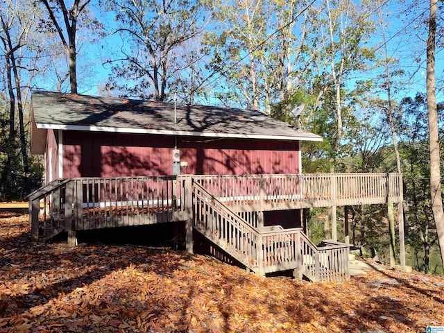 exterior space featuring stairs and a deck