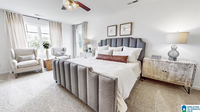 carpeted bedroom with ceiling fan